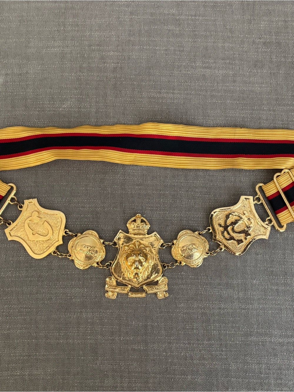 Gold Tone Lion Medallion Ceremonial Belt with Red, Black and Gold Ribbon